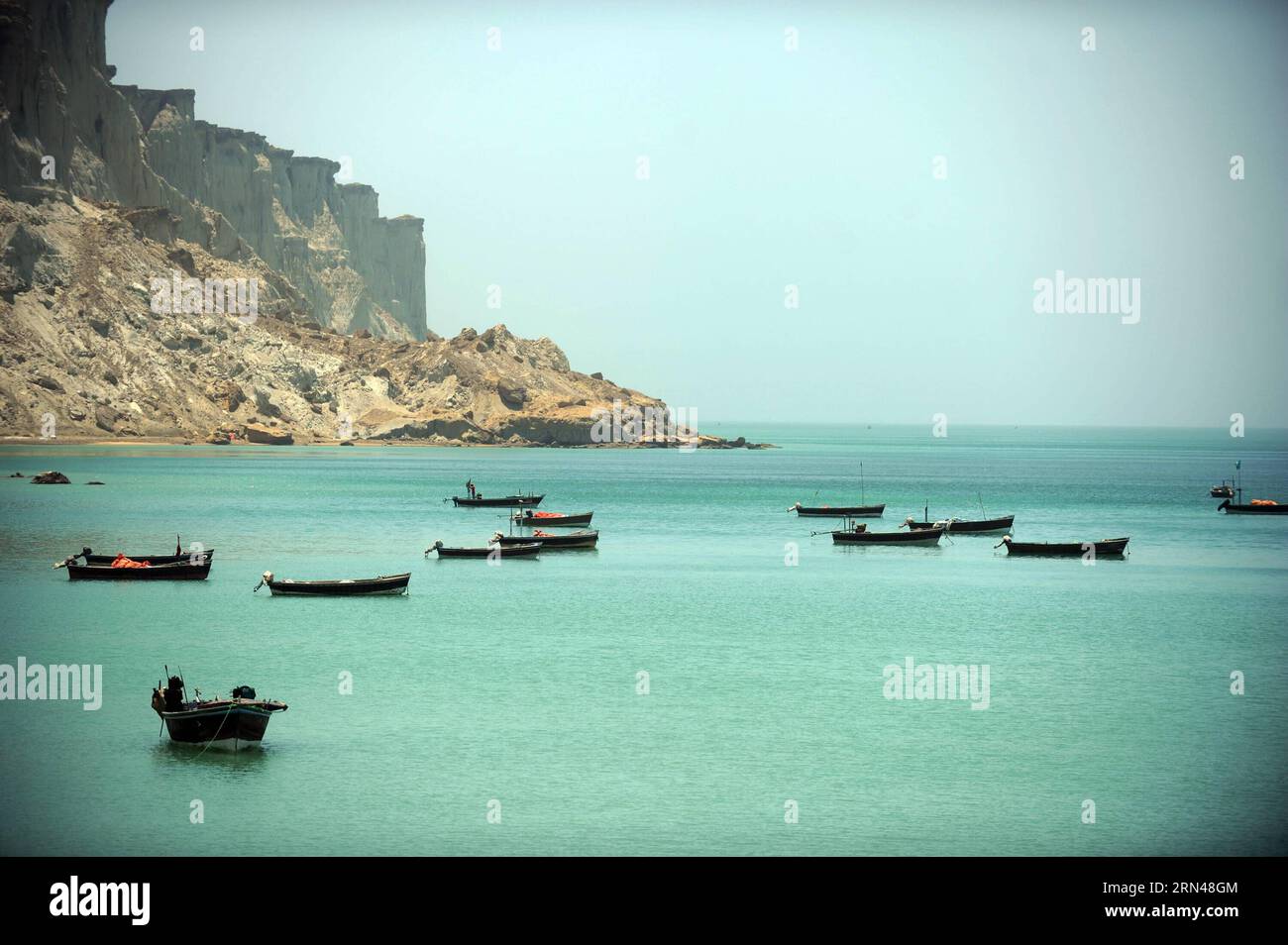 (150512) -- KARACHI,   -- Fishboats berth in the bay of Gwadar, southwestern Pakistan, on May 11, 2015. Most of local residents in Gwadar live on fishing. Gwadar Port, a warm-water, deep-sea port, is located at the mouth of the Persian Gulf in Gwadar of Pakistan s Baloschistan province. China and Pakistan agreed to build China-Pakistan Economic Corridor (CPEC) to connect the Pakistani port with Kashgar city in China s Xinjiang Uygur Autonomous Region. It will shorten China s routes of oil and gas imports from Africa and the Middle East for thousands of kilometers, making Gwadar a potentially v Stock Photo