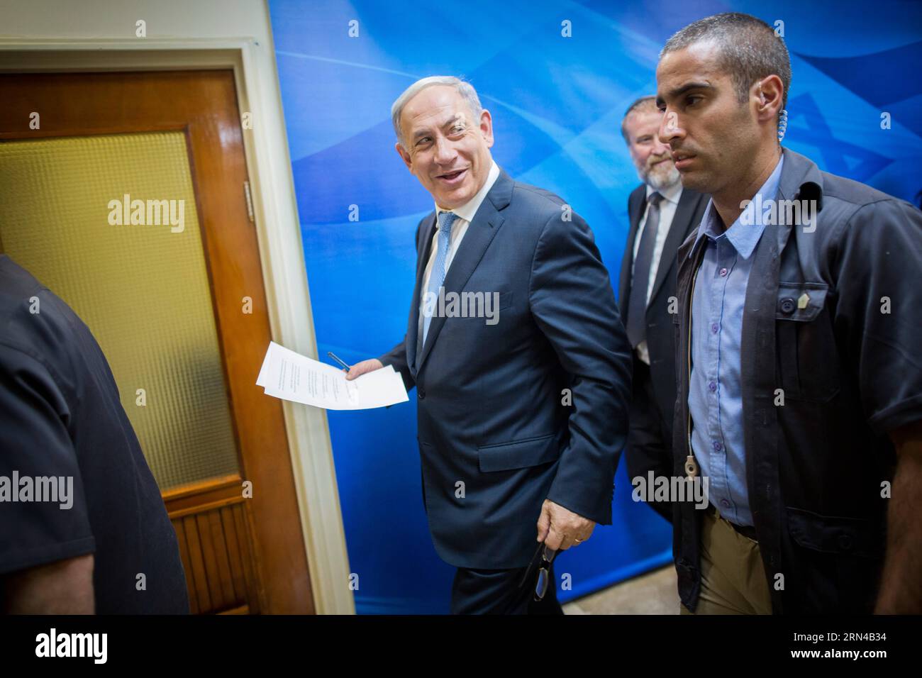 (150515) -- JERUSALEM, May 15, 2015 -- Israeli Prime Minister Benjamin Netanyahu (C) arrives for the first cabinet meeting of the Israel s 34th government at the Prime Minister s office in Jerusalem, on May 15, 2015. Israeli Prime Minister Benjamin Netanyahu s right-wing new coalition government was sworn in late Thursday night, after the parliament approved it by a razor-thin 61-59 majority. JINI/) (lrz) MIDEAST-JERUSALEM-ISRAEL-34TH GOV T-FIRST CABINET MEETING YonatanxSindel PUBLICATIONxNOTxINxCHN   Jerusalem May 15 2015 Israeli Prime Ministers Benjamin Netanyahu C arrives for The First Cabi Stock Photo