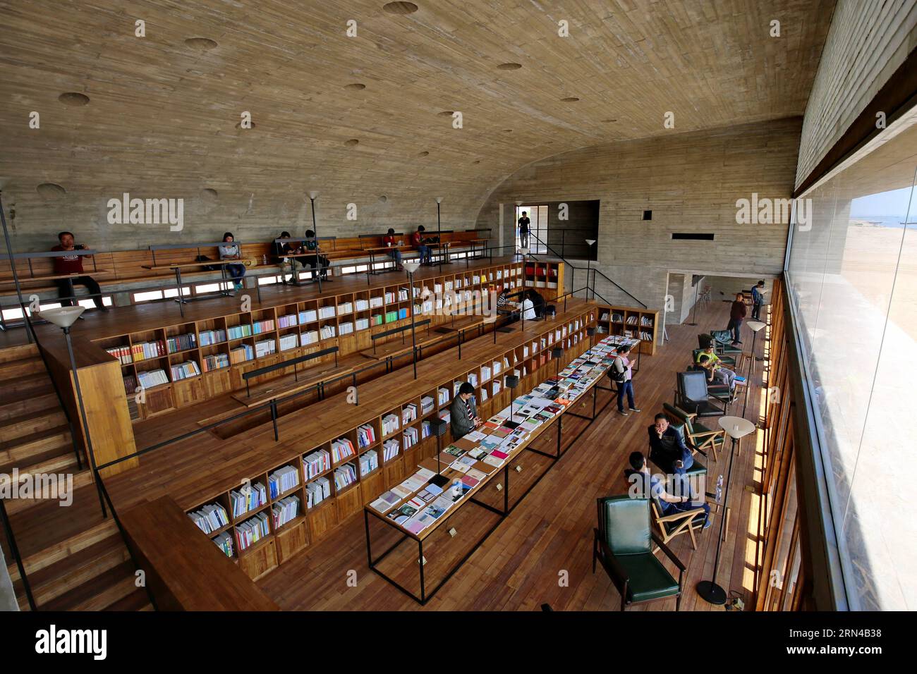QINHUANGDAO, May 2015 People read books at the seaside public