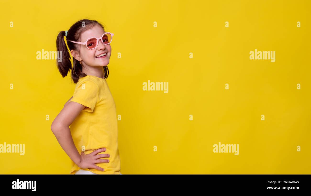 Child wearing yellow shirt hi-res stock photography and images - Alamy