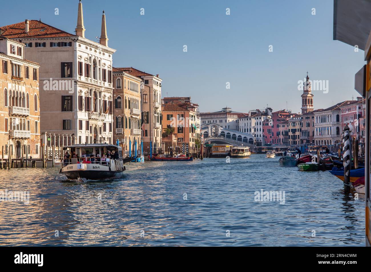 Grand Canal with water buses, vaporetti and the Rialto Bridge, Venice, Veneto, Northern Italy, Italy. UNESCO World Heritage Site Stock Photo