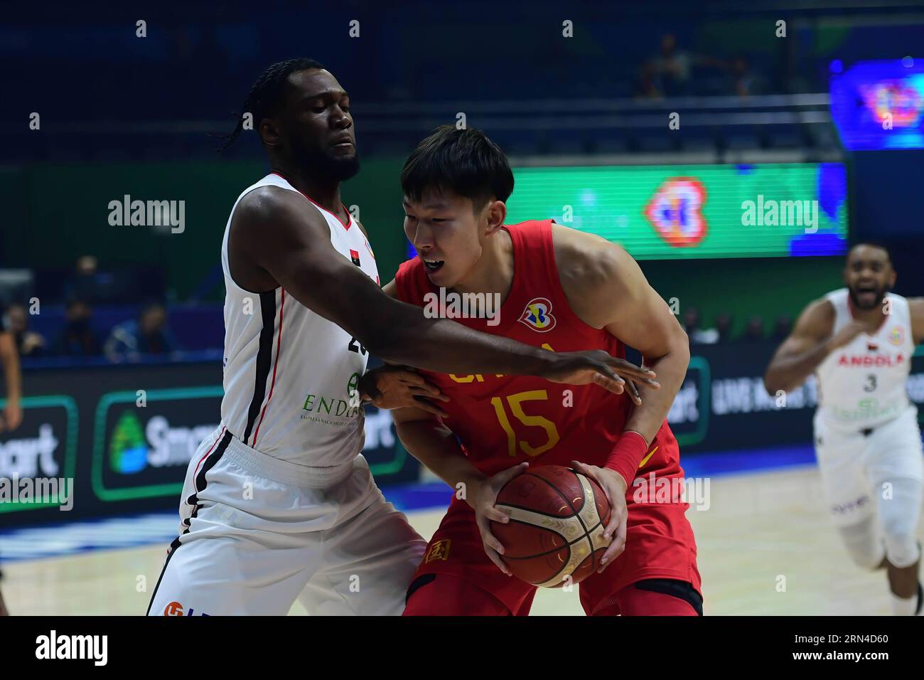 Quezon, Philippines. 31st Aug, 2023. Bruno Fernando (L) of the Angola men basketball team and Qi Zhou (R) of China men basketball team in action during the FIBA Men's Basketball World Cup 2023 match between China and Angola at the Araneta Coliseum. Final score Angola 76:83 China. Credit: SOPA Images Limited/Alamy Live News Stock Photo