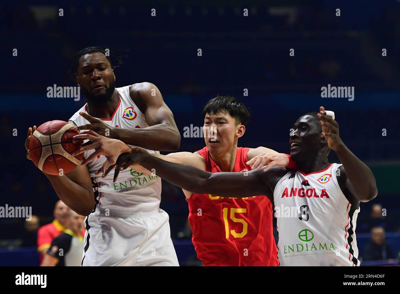 Quezon, Philippines. 31st Aug, 2023. Bruno Fernando (L), Jilson Bango (R) of the Angola men basketball team and Qi Zhou (M) of China men basketball team in action during the FIBA Men's Basketball World Cup 2023 match between China and Angola at the Araneta Coliseum. Final score Angola 76:83 China. Credit: SOPA Images Limited/Alamy Live News Stock Photo