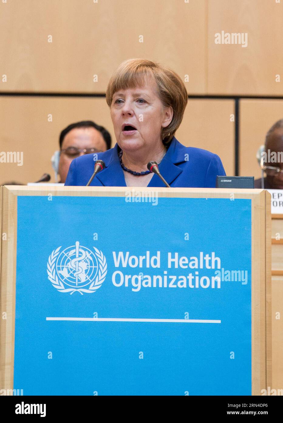 POLITIK WHO-Jahresversammlung in Genf (150518) -- GENEVA, May 18, 2015 -- German Chancellor Angela Merkel addresses the opening ceremony of the 68th session of the World Health Assembly (WHA) in Geneva, Switzerland, on May 18, 2015. The 68th session of the WHA on Monday kicked off here, over 3,000 delegates from 194 member states would focus on the discussion of Ebola outbreaks and the post-2015 health agenda. ) SWITZERLAND-GENEVA-WHA-68TH SESSION XuxJinquan PUBLICATIONxNOTxINxCHN   politics Who Annual Meeting in Geneva  Geneva May 18 2015 German Chancellor Angela Merkel addresses The Opening Stock Photo