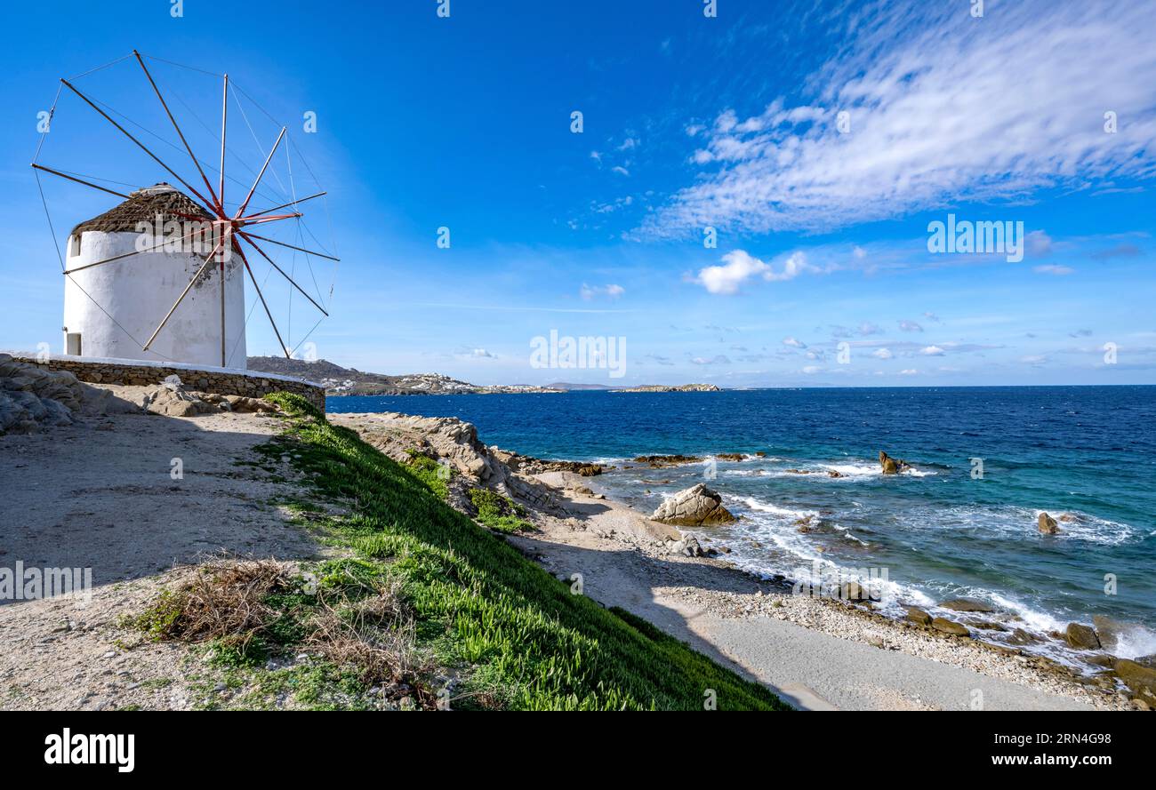 Cycladic windmill on the coast, Kato Milli, Mykonos Town, Mykonos, Greece Stock Photo