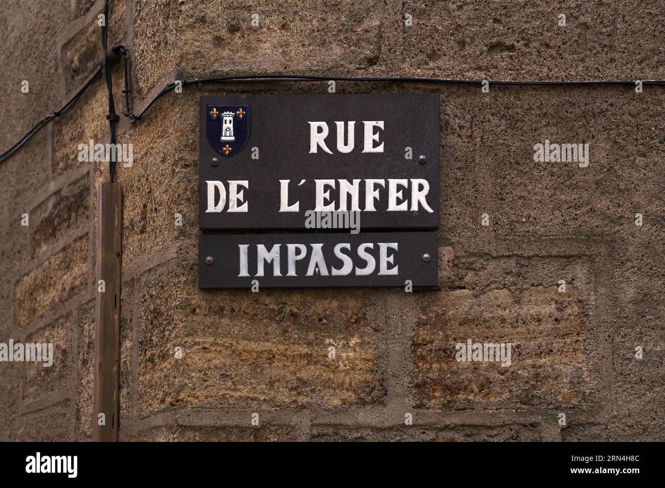 Street sign Rue de l'Enfer, Hell Road, Saint-Saturnin, Puy-de-Dome department, Auvergne-Rhone-Alpes region, France Stock Photo