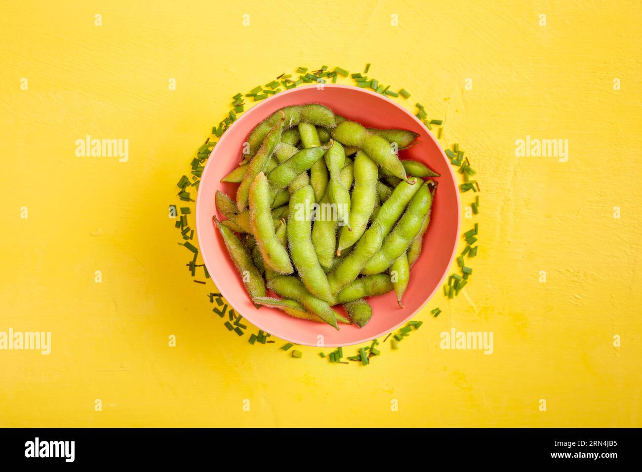Flat lay edamame beans bowl with fresh cut chives Stock Photo Alamy