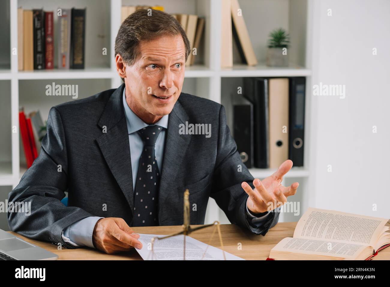 Mature lawyer having conversation court room Stock Photo