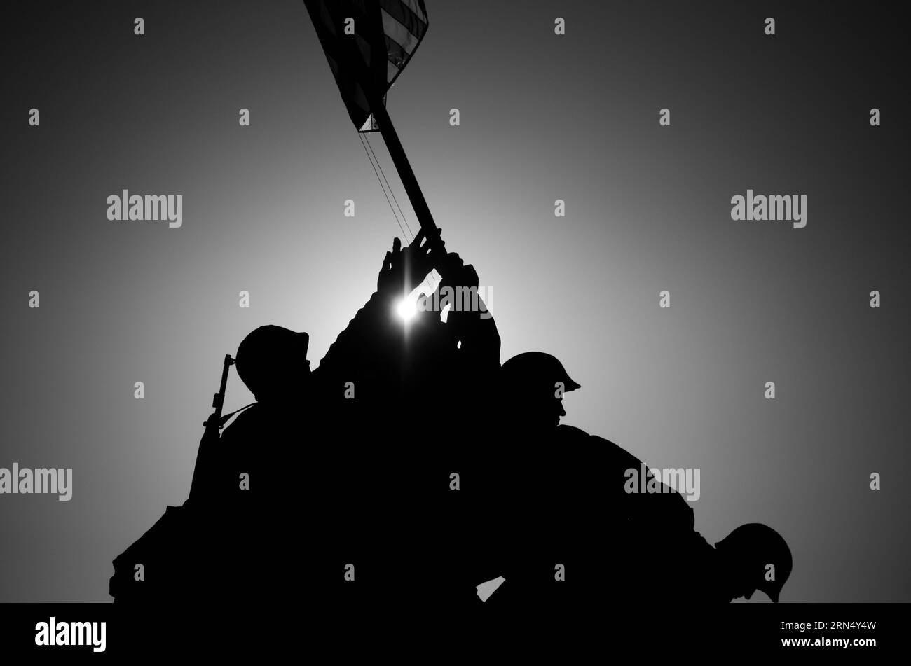 Iwo Jima Memorial in silhouette, Arlington. Black and white photograph ...