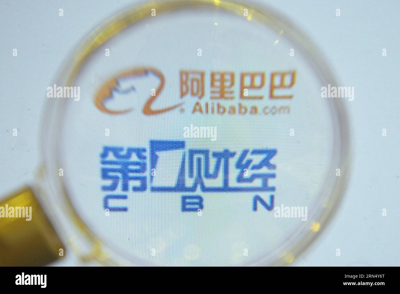 (150604) -- HANGZHOU, June 4, 2015 -- Photo taken on June 4, 2015 shows the logos of Alibaba Group and China Business Network (CBN). Alibaba, China s online e-commerce company, together with Shanghai Media Group (SMG), announced Thursday that Alibaba would invest 1.2 billion yuan (about 193.56 million U.S. dollars) to CBN for participation. CBN is attached to the SMG. ) (mp) CHINA-HANGZHOU-ALIBABA GROUP-CBN-INVESTMENT (CN) LongxWei PUBLICATIONxNOTxINxCHN   Hangzhou June 4 2015 Photo Taken ON June 4 2015 Shows The Logo of Alibaba Group and China Business Network CBN Alibaba China S Online e Com Stock Photo