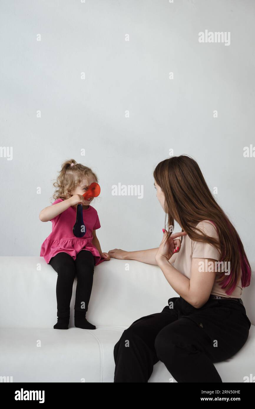 Speech therapist and girl in the office Stock Photo