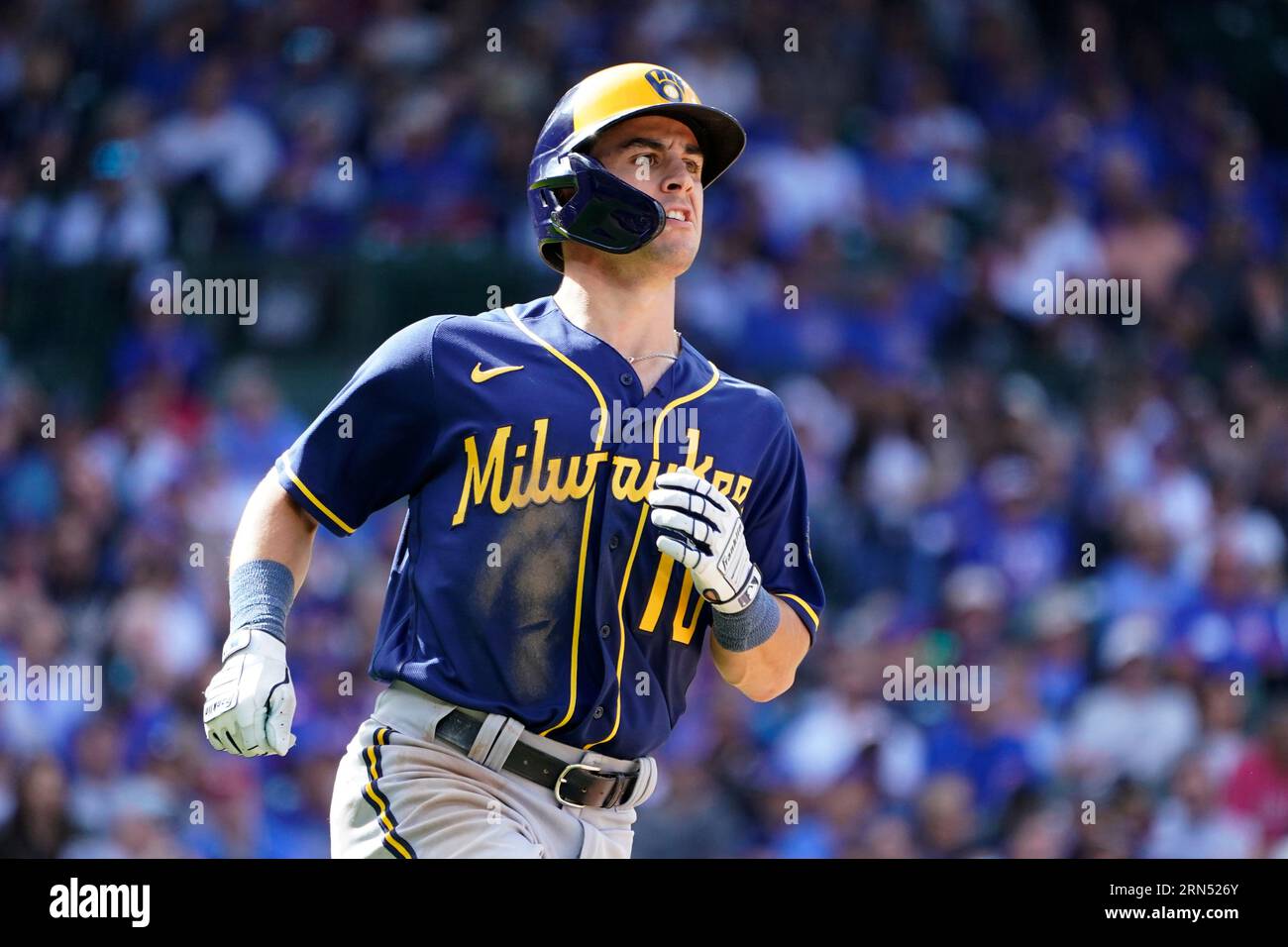 Milwaukee Brewers' Sal Frelick watches his hit during a baseball game