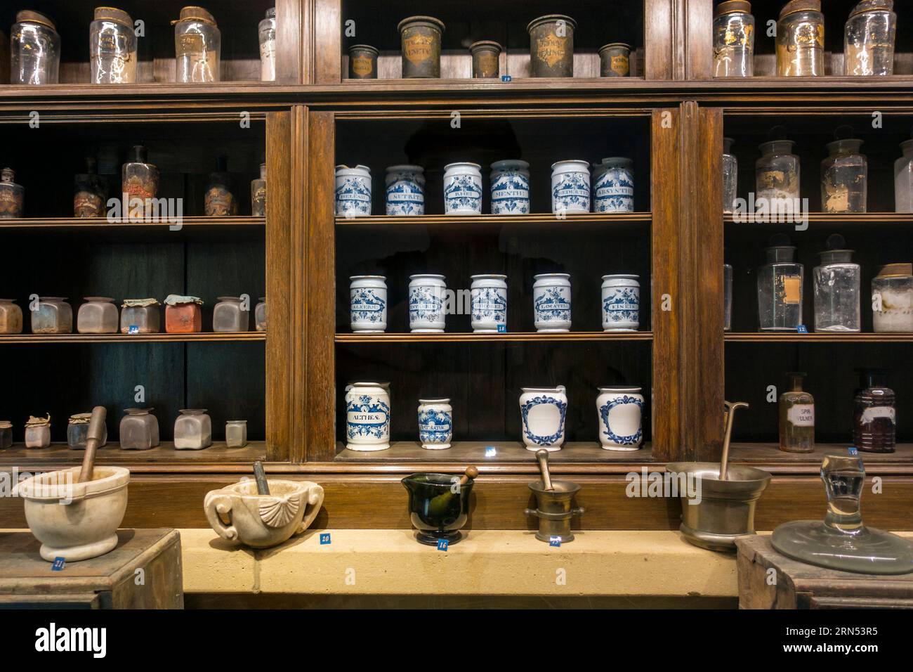 Antique pharmacy cabinet with vintage jars at the Orval Abbey / Abbaye Notre-Dame d'Orval, Villers-devant-Orval, Florenville, Wallonia, Belgium Stock Photo