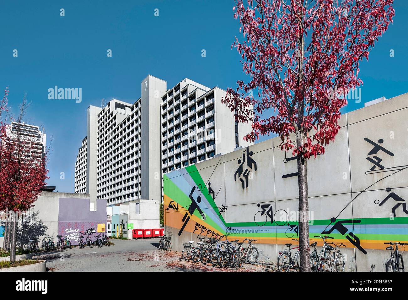 Sports symbols, pictograms and high-rise building, Olympic Village, Munich, Upper Bavaria, Bavaria, Germany Stock Photo