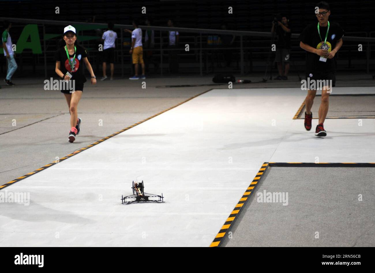 (150615) -- BEIJING, June 15, 2015 -- Competitors control their elastic model car during the competition in Beijing, capital of China, June 15, 2015. The 2015 Formula-E China Design Championship was held at Beijing University of Technology on Monday. Thirty-five teams from fourteen universities in China competed for the opportunity to attend the global final held in Los Angeles in August. ) (zkr) CHINA-BEIJING-FORMULA-E DESIGN CHAMPIONSHIP(CN) LiuxYongzhen PUBLICATIONxNOTxINxCHN   Beijing June 15 2015 Competitors Control their Elastic Model Car during The Competition in Beijing Capital of Chin Stock Photo