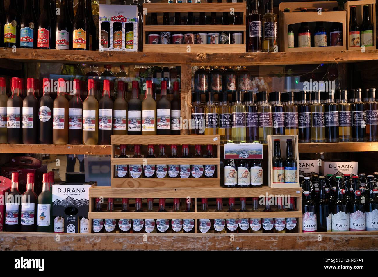 Display regional products, beer, olive oil, wine, Mont-Dore, Departement Puy-de-Dome, Region Auvergne-Rhone-Alpes, France Stock Photo