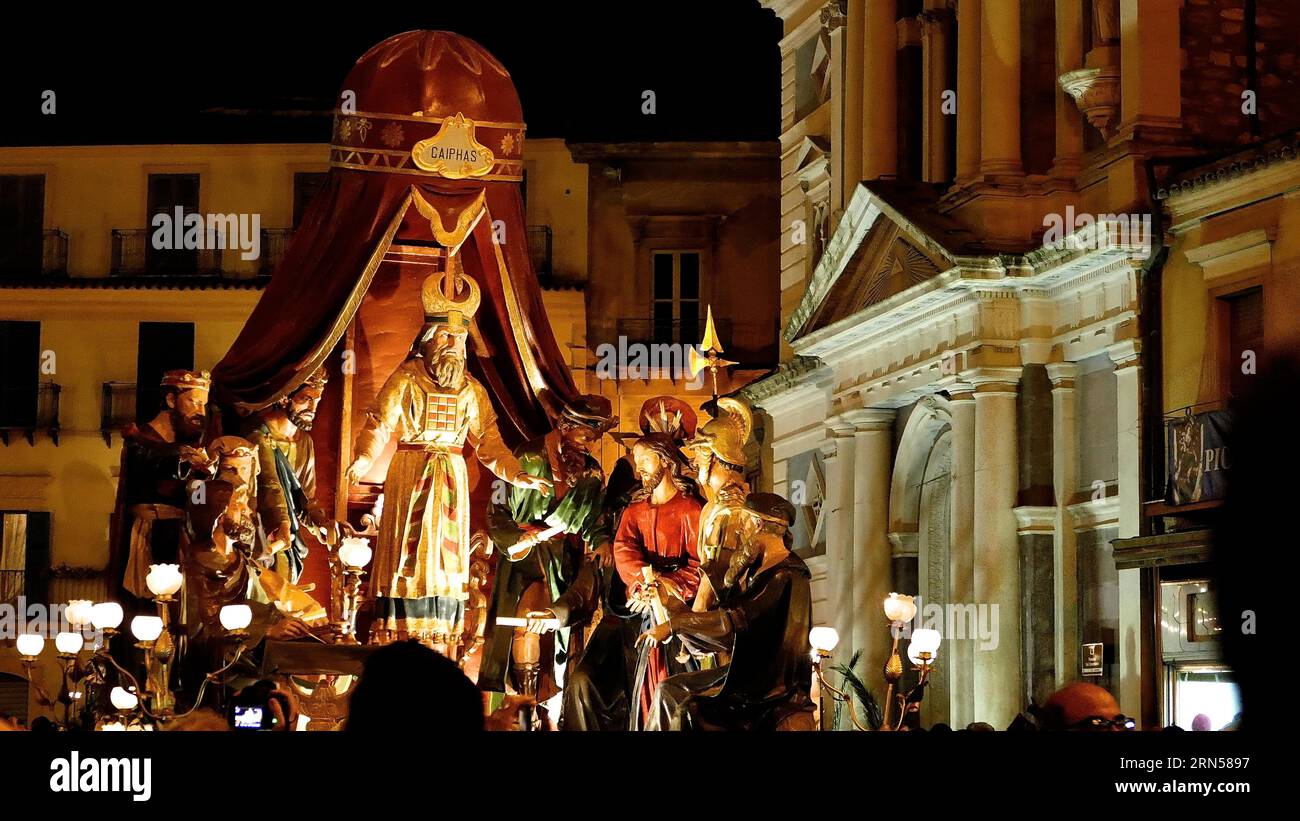 Chariot of Caiphas, night shot, Vare, processional chariot, illuminated, depicting Christian scenes, life-size wooden figures, Easter procession Stock Photo