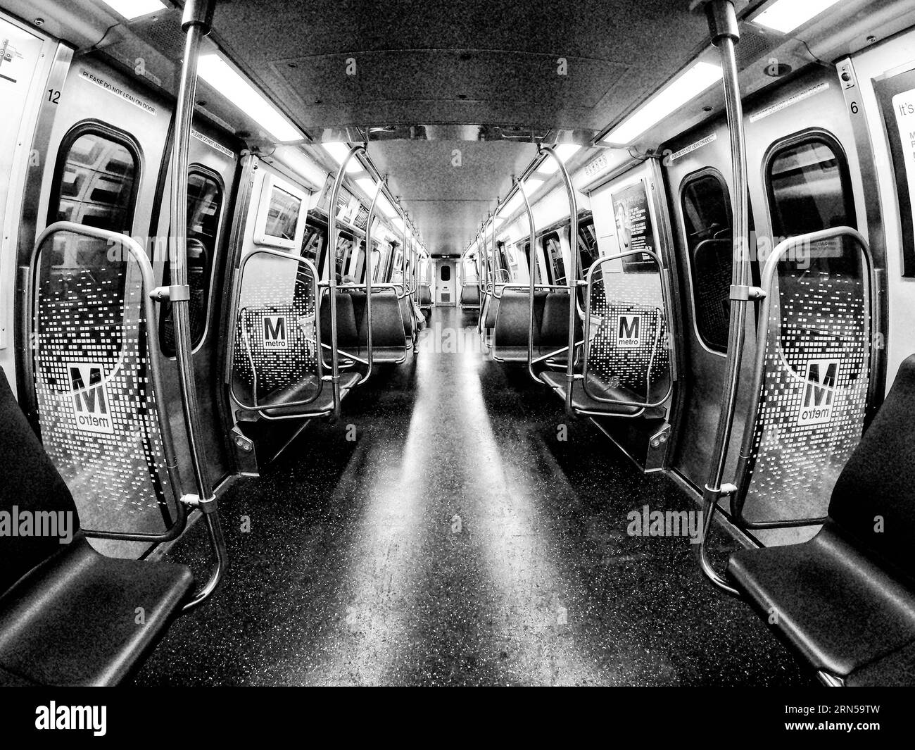 WASHINGTON DC — A black and white photograph of the inside of one of the newer metro cars on the WMATA network. Stock Photo