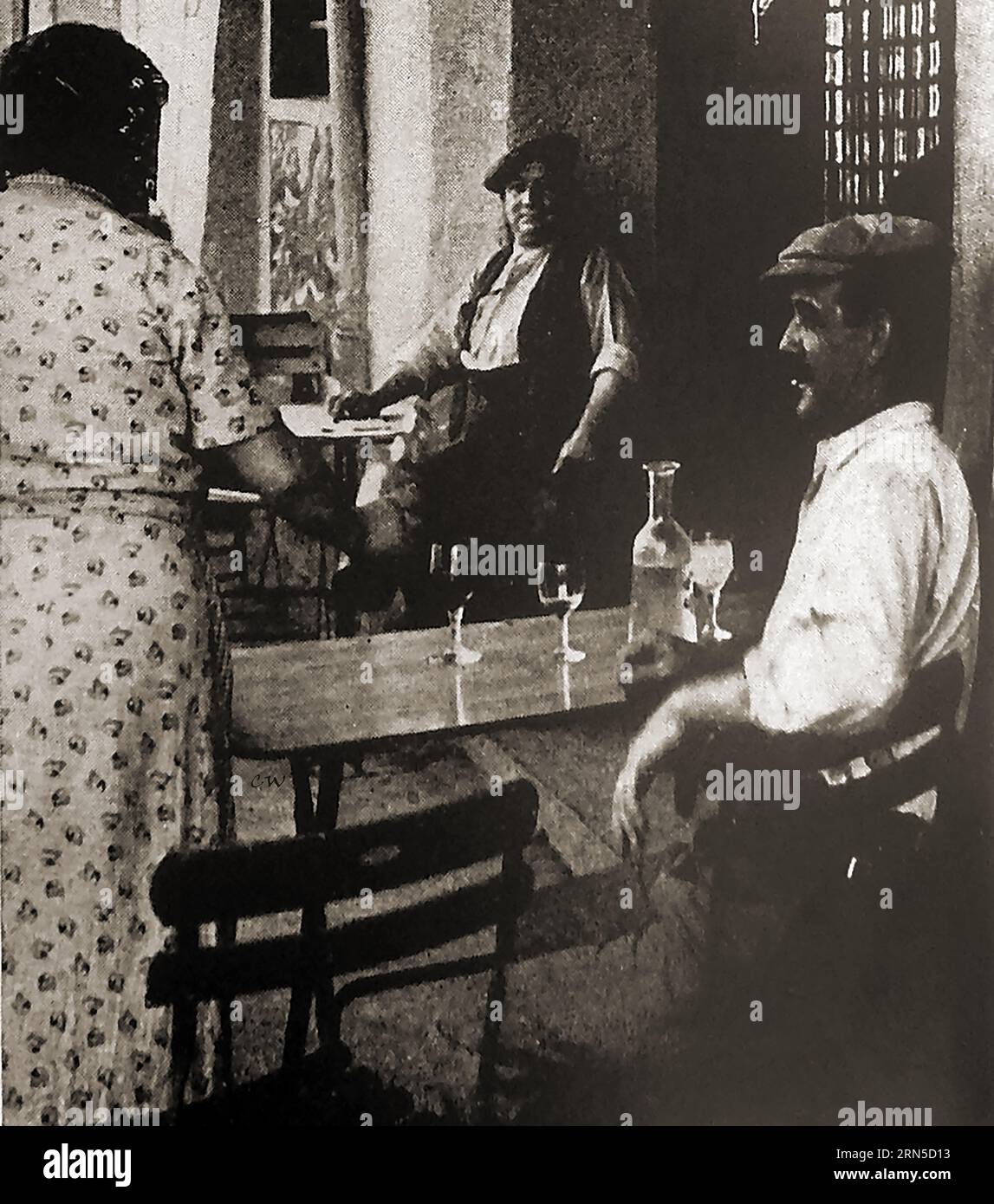 A typical café scene in France 1939. - Une scène de café typique en France 1939. Stock Photo