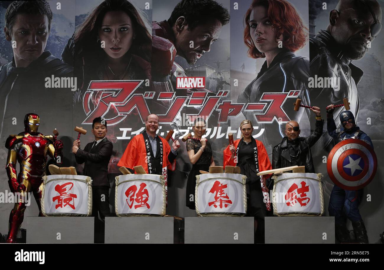 (150623) -- TOKYO, June 23, 2015 -- (L to R) Iron Man, Japanese comedian Hiroyuki Miyasako, film director Joss Whedon, Japanese actress Ryoko Yonekura, American actress Elizabeth Olsen, Japanese actor Naoto Takenaka, Captain America pose for photographers during a premiere event for the new film Avengers: Age of Ultron in Tokyo, Japan, June 23, 2015. The film will be shown to the public from July 4 in Japan. )(dzl) JAPAN-TOKYO-MOVIE-AVENGERS Stringer PUBLICATIONxNOTxINxCHN   150623 Tokyo June 23 2015 l to r Iron Man Japanese Comedian Hiroyuki  Film Director Joss Whedon Japanese actress Ryoko Y Stock Photo