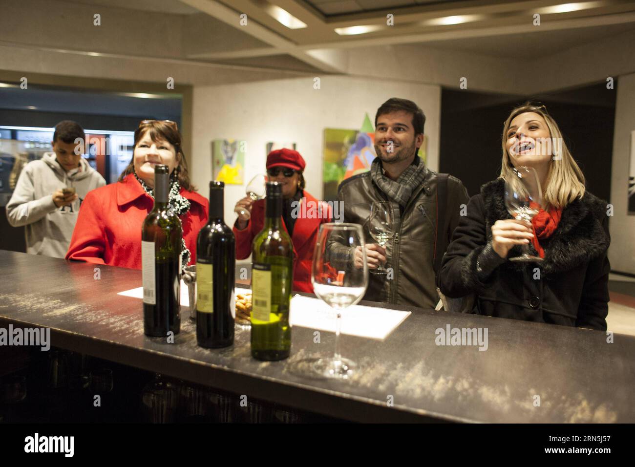 Image taken on June 25, 2015 shows visitors taking part in a wine tasting in the tasting room of the O. Fournier Winery, in La Consulta city, Mendoza province, 1,170km away of Buenos Aires city, Argentina. ) (jg) (da) ARGENTINA-MENDOZA-INDUSTRY-WINE-FEATURE MARTINxZABALA PUBLICATIONxNOTxINxCHN   Image Taken ON June 25 2015 Shows Visitors Taking Part in a Wine Tasting in The Tasting Room of The O Fournier Winery in La CONSULTA City Mendoza Province 1 170km Away of Buenos Aires City Argentina JG there Argentina Mendoza Industry Wine Feature MartinXZabala PUBLICATIONxNOTxINxCHN Stock Photo