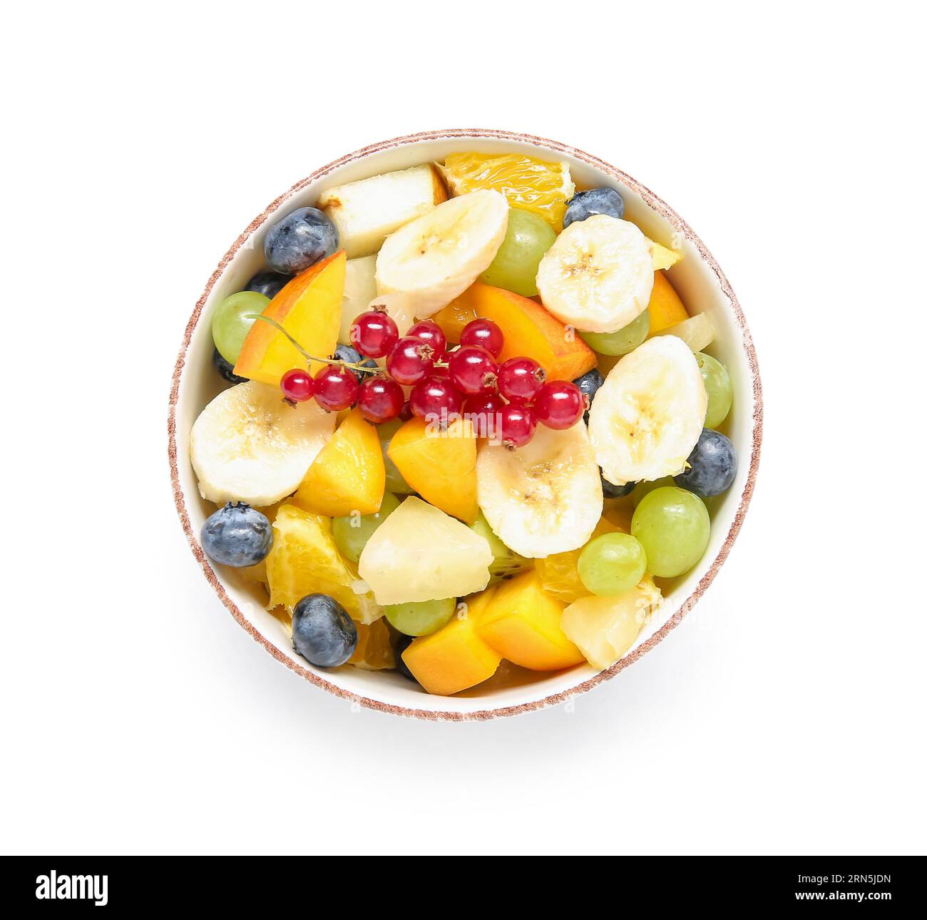 Bowl with fresh fruit salad on white background Stock Photo - Alamy