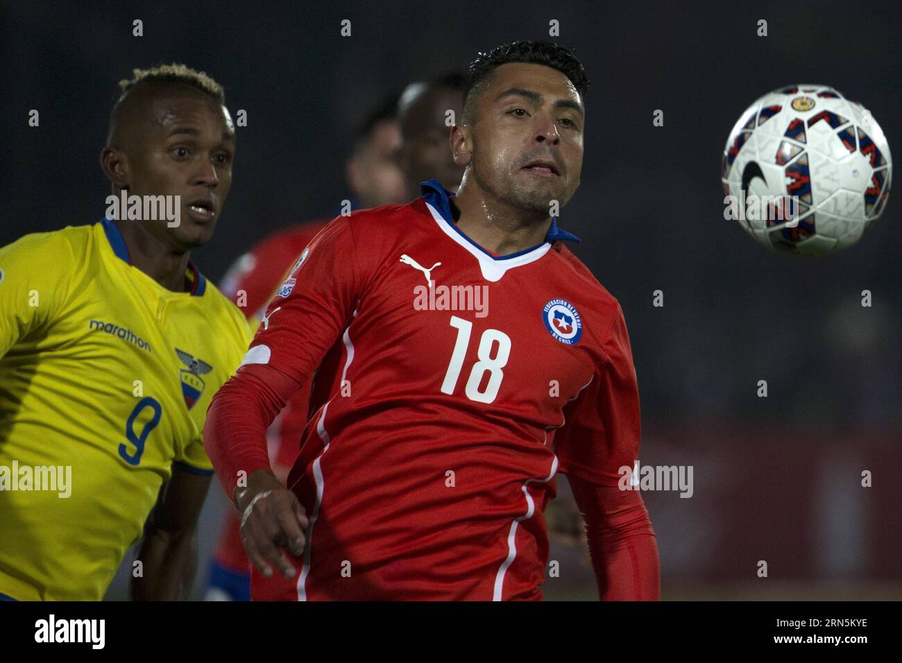 Image taken on June 11, 2015 shows Chilean player Gonzalo Jara (R) competing during a group match at the 2015 Chile Copa America in Santiago, Chile. The South American Football Confederation Disciplinary Unit decided on June 28, 2015 to impose a suspension of three official games on Gonzalo Jara because of his inappropriate touching Uruguayan striker Edinson Cavani. ) (jp) (SP)CHILE-SANTIAGO-COPA AMERICA-GONZALO JARA GuillermoxArias PUBLICATIONxNOTxINxCHN   Image Taken ON June 11 2015 Shows Chilean Player Gonzalo Jara r competing during a Group Match AT The 2015 Chile Copa America in Santiago Stock Photo