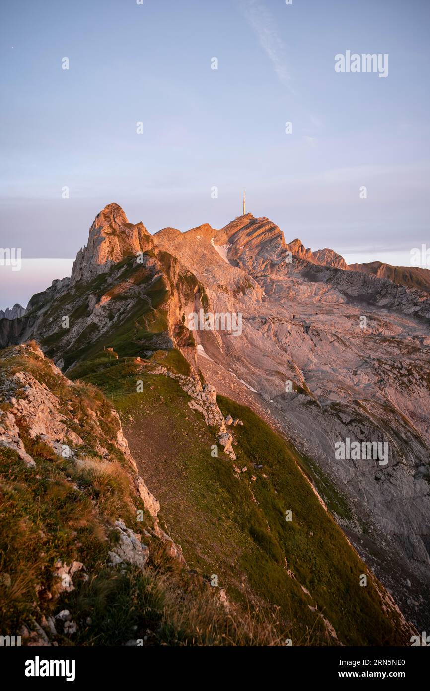 Mountains at sunrise, Saentis, Appenzell Ausserrhoden, Appenzell Alps, Switzerland Stock Photo