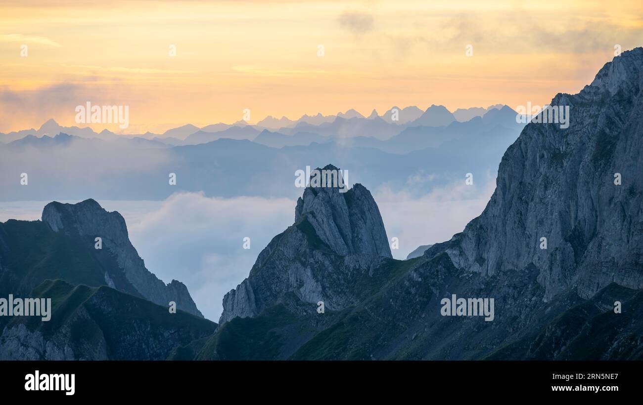 Sunrise, mountains in the fog, Saentis, Appenzell Ausserrhoden, Appenzell Alps, Switzerland Stock Photo