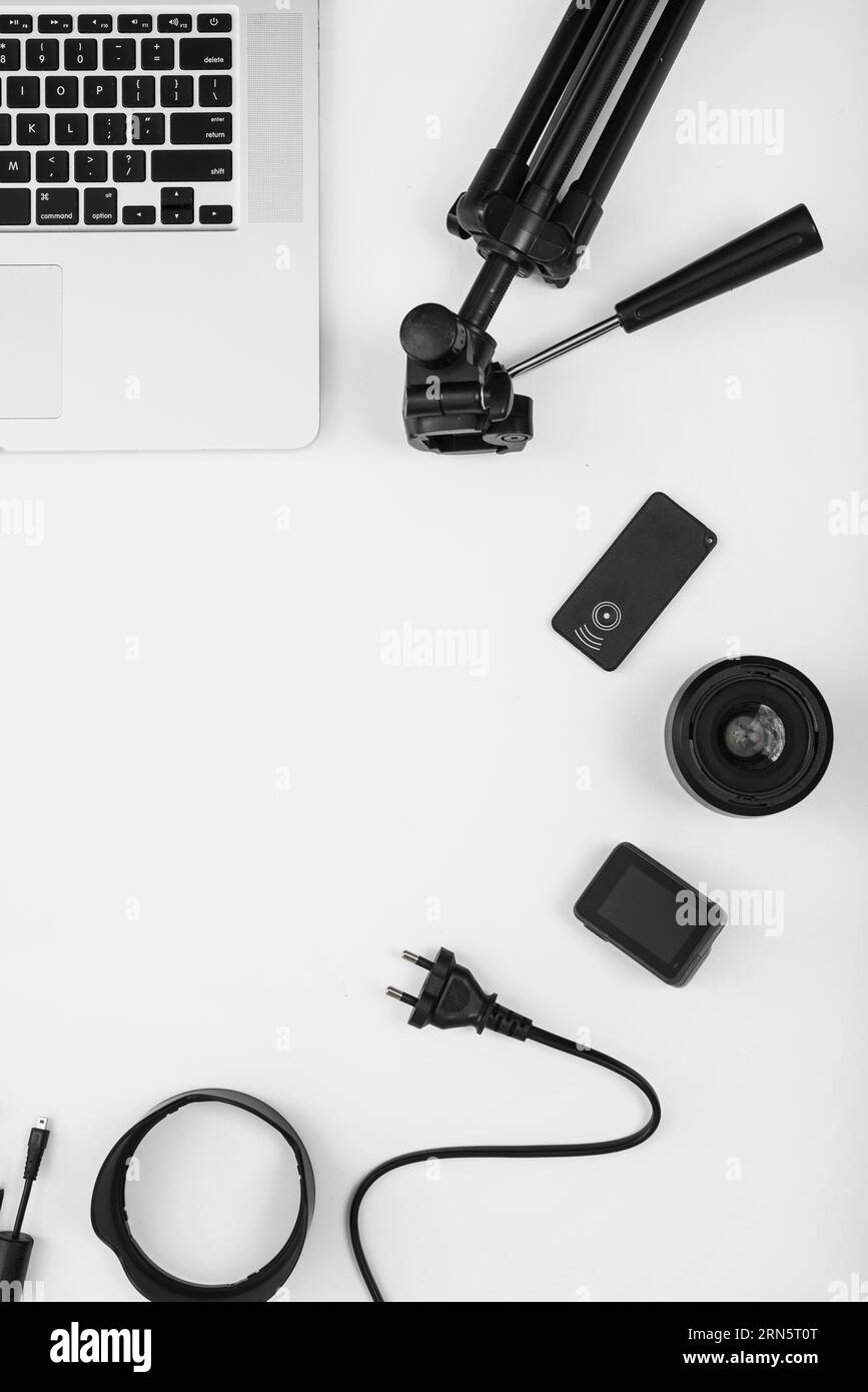 Overhead view camera accessory with laptop white background Stock Photo