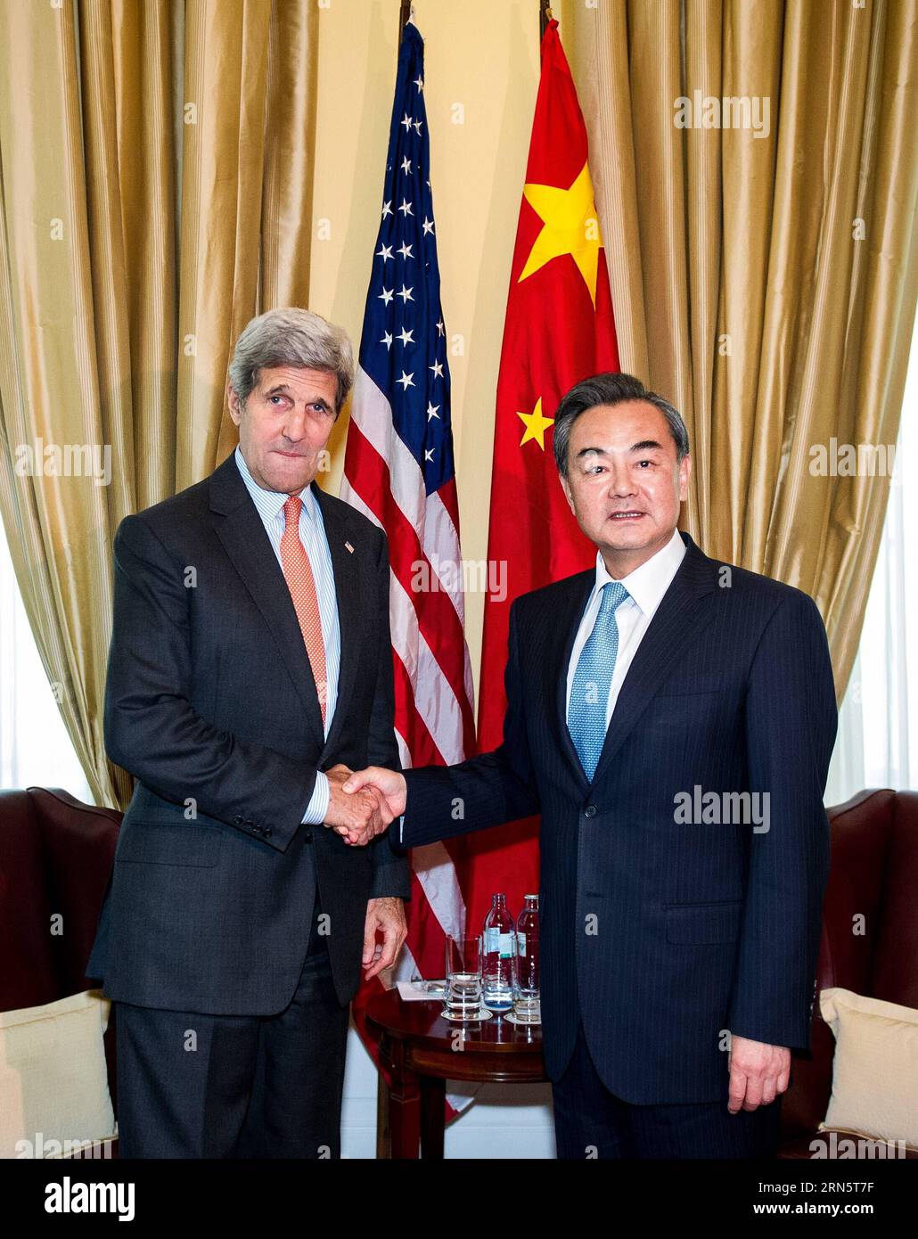 Chinese Foreign Minister Wang Yi(R) meets with U.S. Secretary of State John Kerry during the ongoing nuclear negotiation in Vienna, Austria, on July 2, 2015. ) AUSTRIA-VIENNA-CHINA-FM-U.S.-SECRETARY OF STATE-MEETING QianxYi PUBLICATIONxNOTxINxCHN   Chinese Foreign Ministers Wang Yi r Meets With U S Secretary of State John Kerry during The ongoing Nuclear Negotiation in Vienna Austria ON July 2 2015 Austria Vienna China FM U S Secretary of State Meeting QianxYi PUBLICATIONxNOTxINxCHN Stock Photo