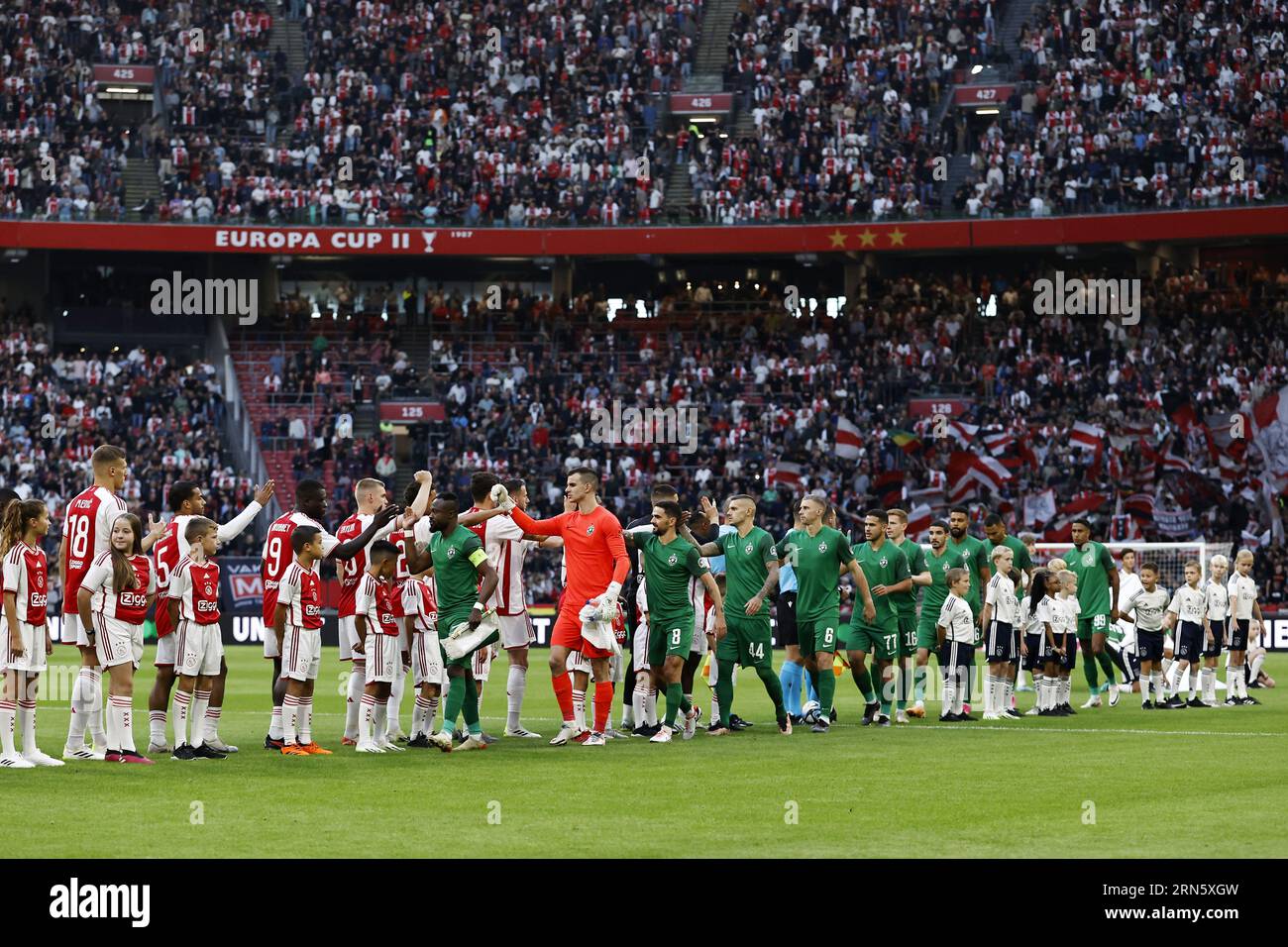AMSTERDAM - (lr) Jakov Medic of Ajax, Owen Wijndal of Ajax, Brian Brobbey of Ajax,Devyne Rensch of Ajax,PFK Ludogorets 1945 goalkeeper Simon Sluga, Claude Goncalves of PFK Ludogorets 1945,Marcel Heister of PFK Ludogorets 1945, Caio Vidal Rocha or PFK Ludogorets 1945, Aslak Fonn Witry of PFK Ludogorets 1945 during the UEFA Europa League play-offs match between Ajax Amsterdam and PFC Ludogorets at Johan Cruijff ArenA on August 31, 2023 in Amsterdam, Netherlands. ANP MAURICE VAN STONE Stock Photo