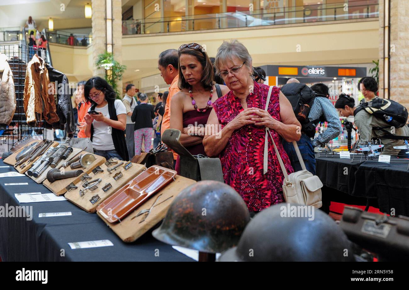 (150705) -- LOS ANGELES, July 5, 2015 -- People visit the exhibition named Welcome Home, Flying Tigers held at Puente Hill Mall in Los Angeles, the United States, on July 5, 2015. A cultural exhibition named Welcome Home, Flying Tigers is held here in order to commemorate the 70th anniversary of Chinese people s Anti-Japanese War and the World Anti-Fascist War. ) U.S.-LOS ANGELES-FLYING TIGERS-EXHIBITION ZhangxChaoqun PUBLICATIONxNOTxINxCHN   150705 Los Angeles July 5 2015 Celebrities Visit The Exhibition Named Welcome Home Flying Tigers Hero AT Puente Hill Mall in Los Angeles The United State Stock Photo