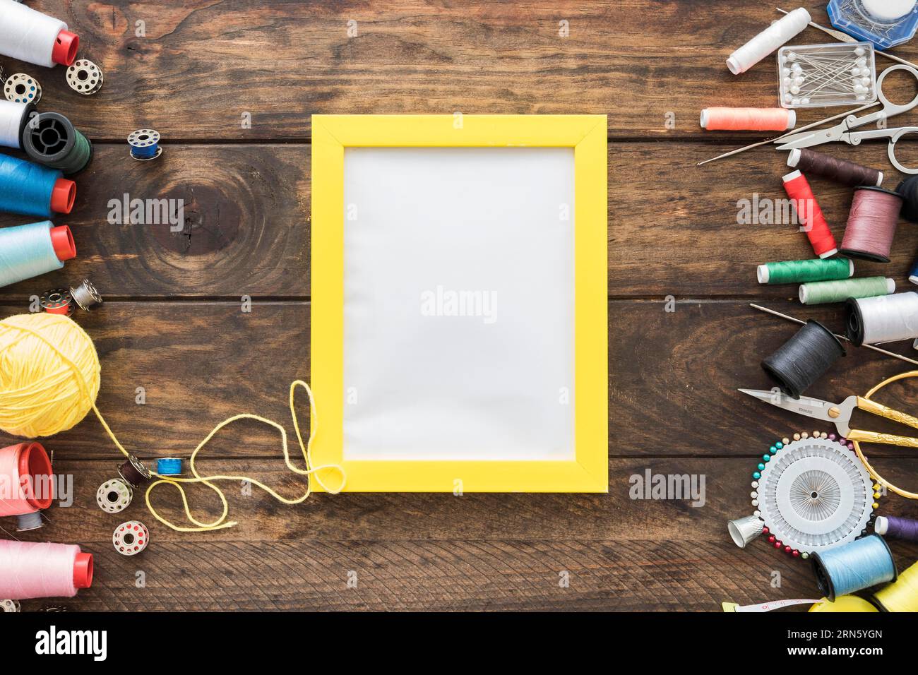 Sewing supplies near frame Stock Photo Alamy