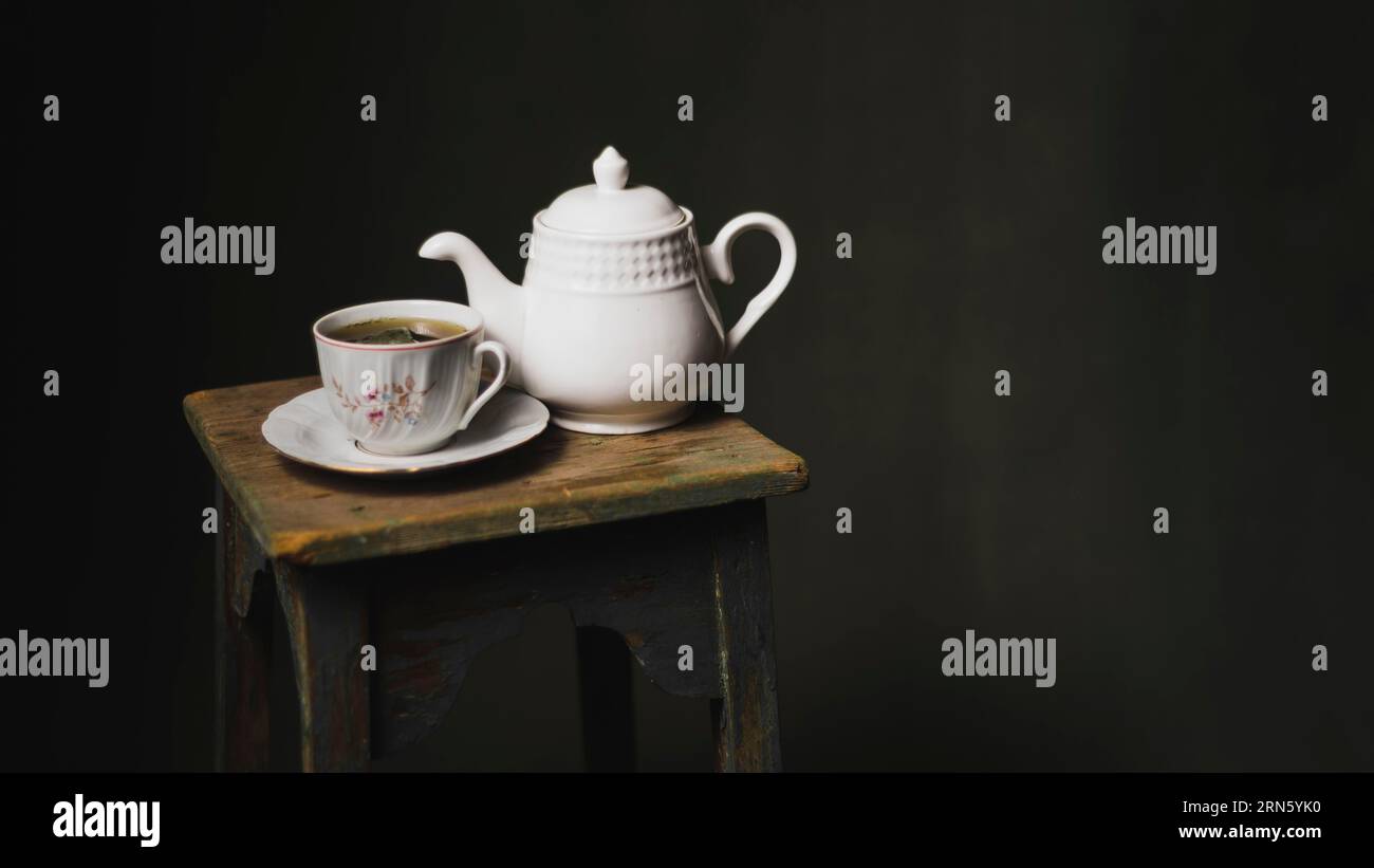 Teapot teacup stool Stock Photo - Alamy