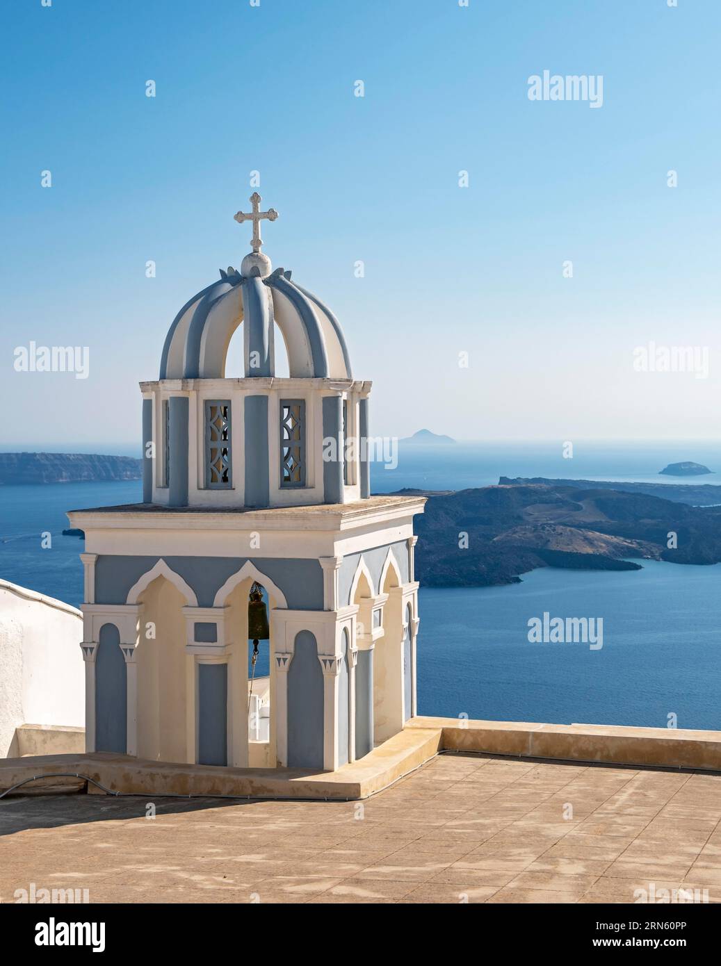 Belfry and view of sea, Church of St. Mark the Evangelist, Firostefani, Santorini, Greece Stock Photo