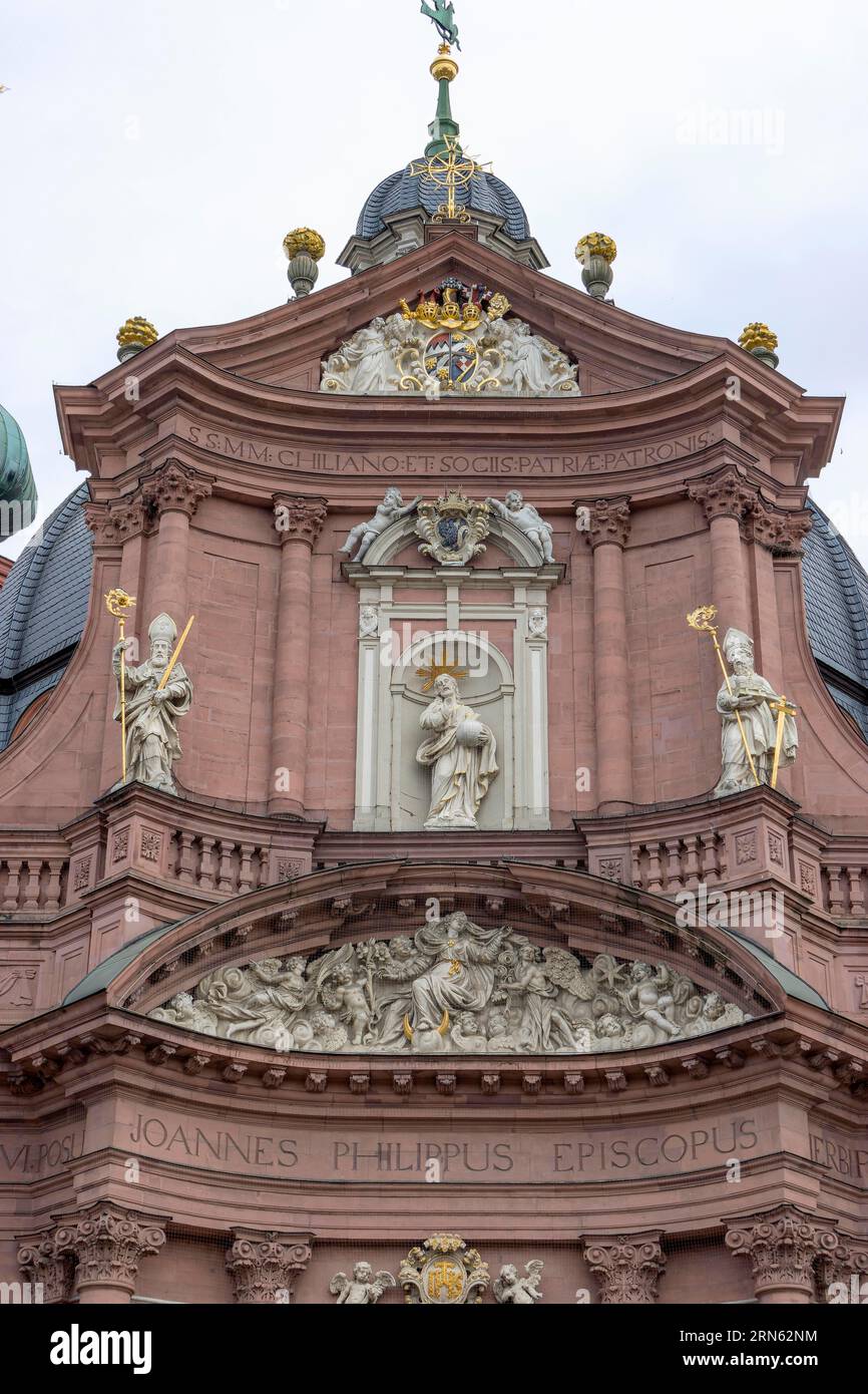 The historic facade with sculptures Neumuenster Catholic Church also Neumuenster St. John the Evangelist and St. John the Baptist, Wuerzburg, Lower Stock Photo