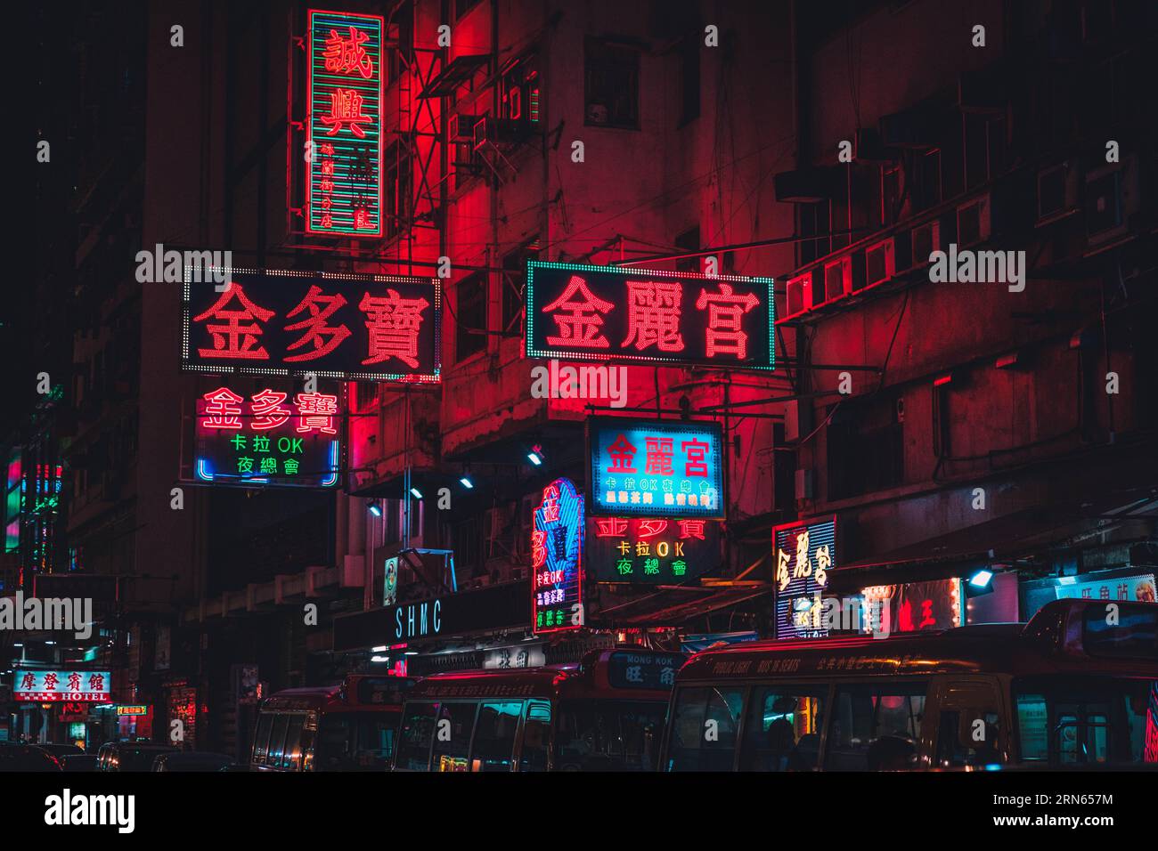 Hong Kong - November, 2019:  Neon lights and shop signs in Hong Kong streets at night Stock Photo