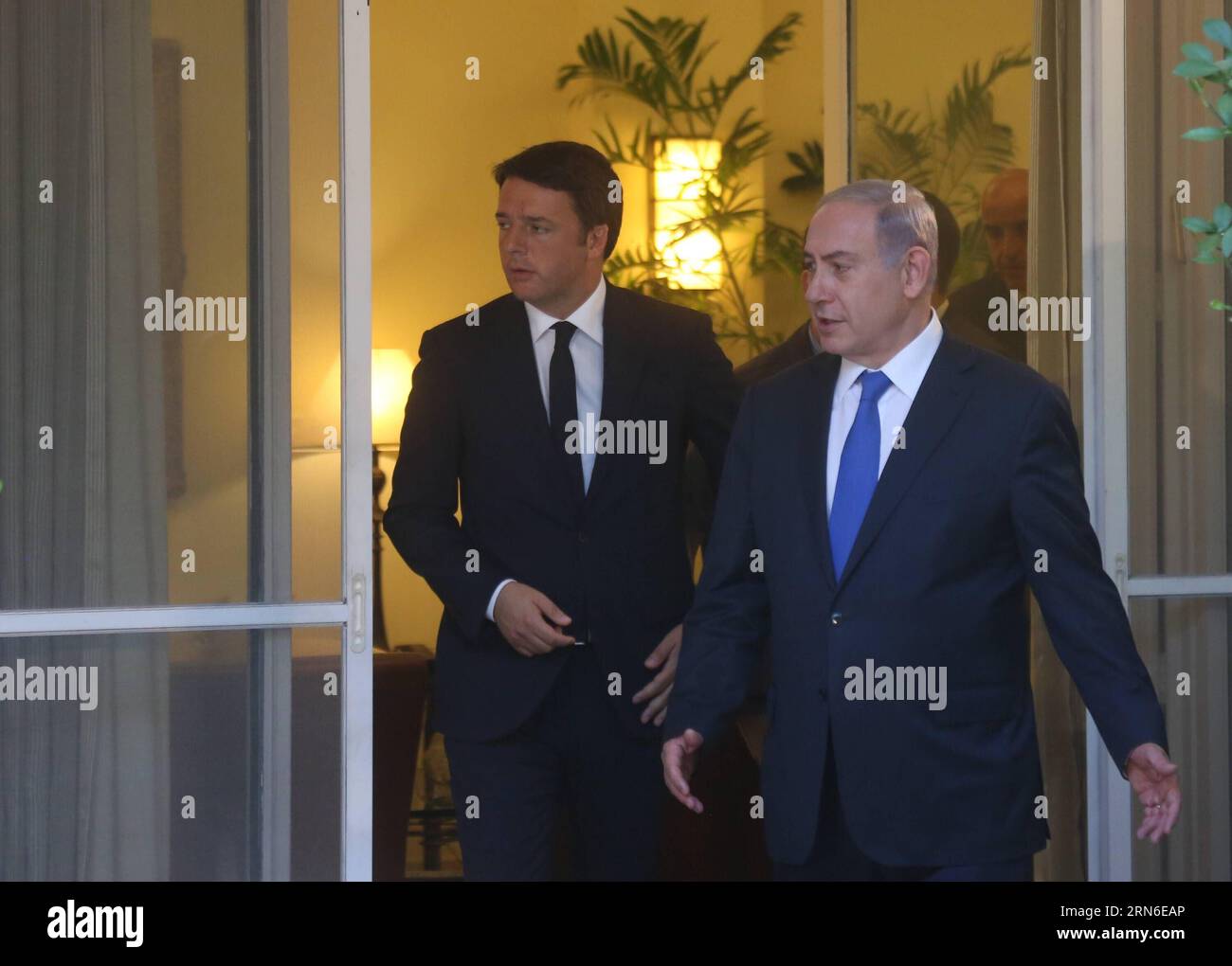 (150722) -- JERUSALEM,  - Israeli Prime Minister Benjamin Netanyahu (R) and his Italian counterpart Matteo Renzi arrive for a joint press conference at Israeli Prime Minister s residence in Jerusalem, on July 21, 2015. Israeli Prime Minister Benjamin Netanyahu met Tuesday in Jerusalem with his Italian counterpart Matteo Renzi, continuing his criticism on the nuclear deal between the world powers and Tehran. Speaking at a joint press conference, Netanyahu said the deal with Iran poses serious risks to Israel, the Middle East, Europe and the entire world. /POOL/Marc Israel Sellem) MIDEAST-JERUSA Stock Photo