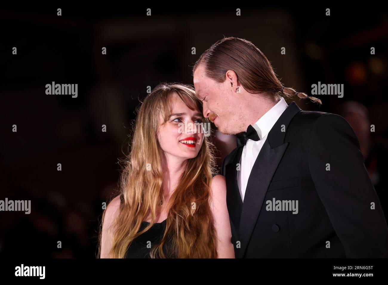 Caleb Landry Jones Right And Katya Zvereva Pose For Photographers caleb-landry-jones-right-and-katya-zvereva-pose-for-photographers