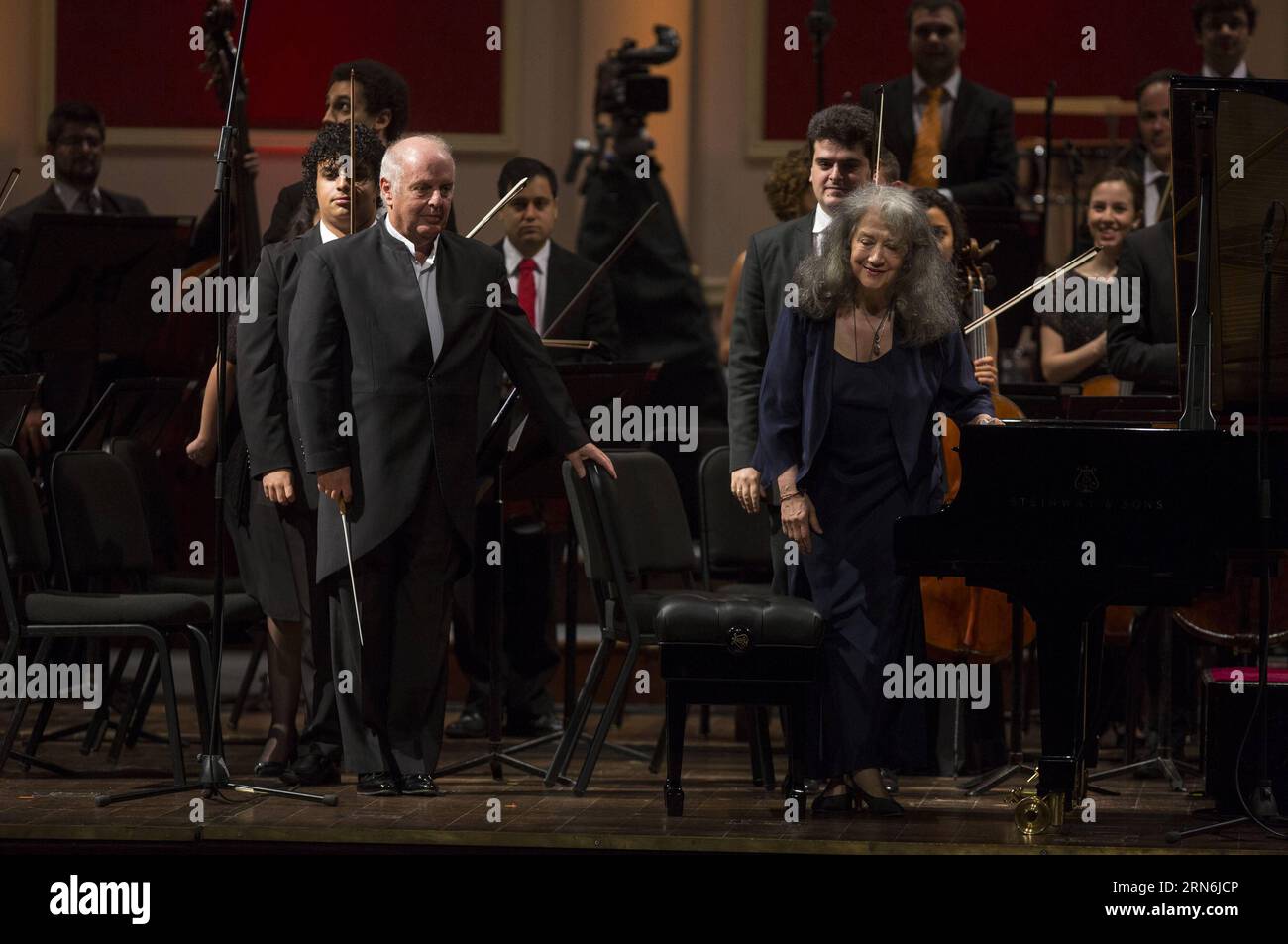 BUENOS AIRES, July 29, 2015 -- Argentinean Musician and orchestra conductor Daniel Barenboim (L) and pianist Martha Argerich (R) respond to the applause during a concert held with the West-Eastern Divan Orchestra at the Colon Theater, in Buenos Aires, capital of Argentina, July 29, 2015. ) (jp) ARGENTINA-BUENOS AIRES-MUSIC-CONCERT MARTINxZABALA PUBLICATIONxNOTxINxCHN   Buenos Aires July 29 2015 Argentinean Musician and Orchestra Conductor Daniel Barenboim l and Pianist Martha Argerich r respond to The Applause during a Concert Hero With The WEST Eastern Divan Orchestra AT The Colon Theatre in Stock Photo