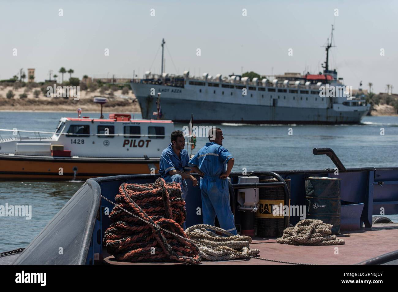WIRTSCHAFT Ägypten: Neuer Suezkanal fertig gestellt (150729) -- ISMAILIA, July 29, 2015 -- Egyptian crew members of a boat are seen prior to their cruise on the new Suez Canal in Ismailia, a port city in Egypt, on July 29, 2015. The dredging work of Egypt s New Suez Canal has been completed and the waterway is ready as well as safe for huge ship navigation, Mohab Memish, head of the Suez Canal Authority (SCA), told reporters in a press conference Wednesday. ) EGYPT-ISMAILIA-NEW SUEZ CANAL PanxChaoyue PUBLICATIONxNOTxINxCHN   Economy Egypt later Suez Canal ready asked 150729 Ismailia July 29 20 Stock Photo