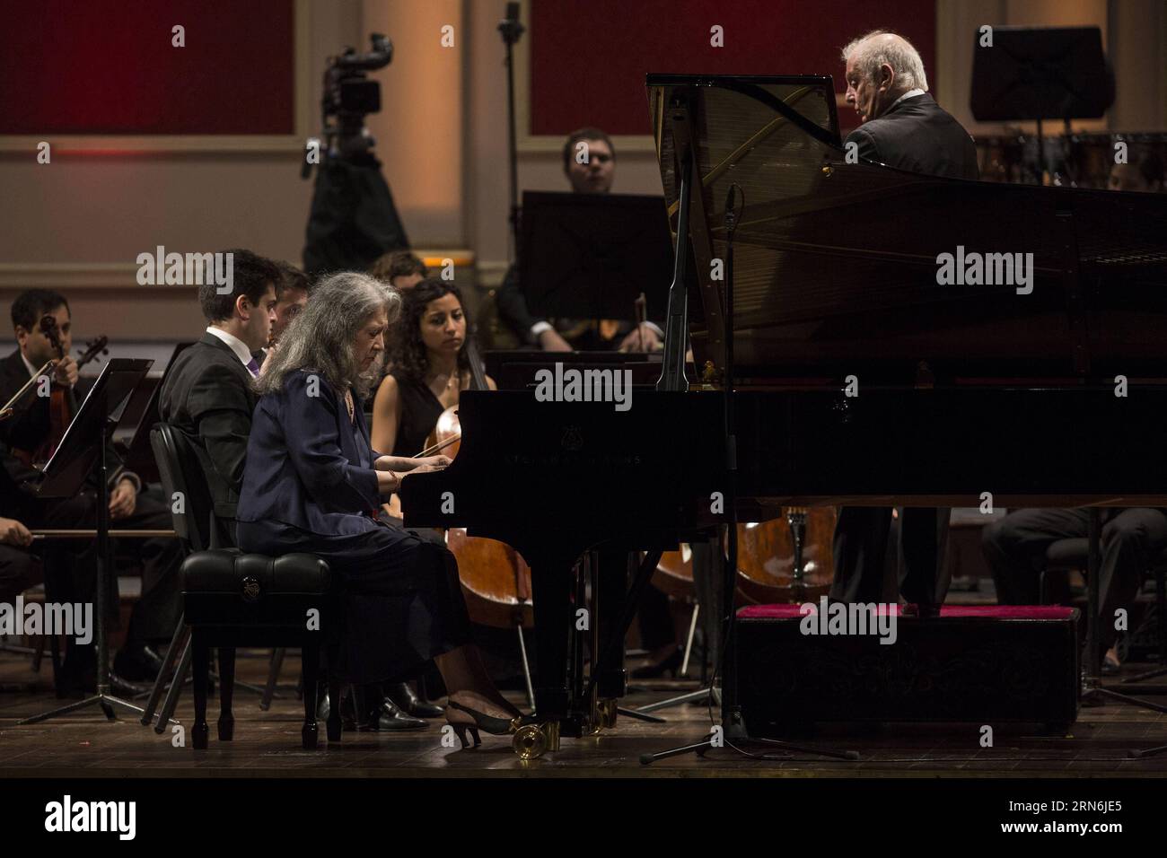 BUENOS AIRES, July 29, 2015 -- Argentinean musician and orchestra conductor Daniel Barenboim (R) and pianist Martha Argerich perform at a concert held with the West-Eastern Divan Orchestra at the Colon Theater, in Buenos Aires, capital of Argentina, July 29, 2015. ) (jp) ARGENTINA-BUENOS AIRES-MUSIC-CONCERT MARTINxZABALA PUBLICATIONxNOTxINxCHN   Buenos Aires July 29 2015 Argentinean Musician and Orchestra Conductor Daniel Barenboim r and Pianist Martha Argerich perform AT a Concert Hero With The WEST Eastern Divan Orchestra AT The Colon Theatre in Buenos Aires Capital of Argentina July 29 2015 Stock Photo