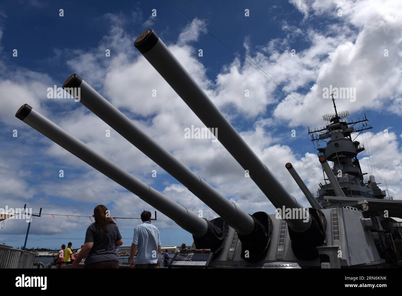 Tourists view USS Missouri (BB-63) in Honolulu, Hawaii, the United States, July 30, 2015. USS Missouri (BB-63) was the site where Japan signed the surrender documents at the end of the World War II. In 1998, this battleship was donated to the USS Missouri Memorial Association and became a museum ship at Pearl Harbor, Hawaii. ) US-HAWAII-USS MISSOURI-MUSEUM SHIP-VISIT YinxBogu PUBLICATIONxNOTxINxCHN   tourists View USS Missouri BB 63 in Honolulu Hawaii The United States July 30 2015 USS Missouri BB 63 what The Site Where Japan signed The Surrender Documents AT The End of The World was II in 199 Stock Photo