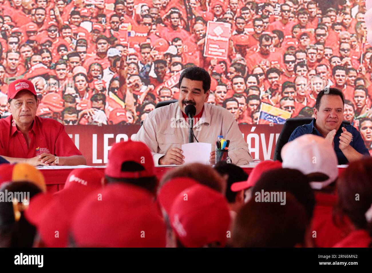 Image provided by Venezuela s Presidency shows Venezuelan President Nicolas Maduro delivering a speech during the meeting with workers of Orinoco Belt, at the Morichal Oilfield, state of Monagas, Venezuela, on Aug. 1, 2015. According to local press, Maduro praised on Saturday the Orinoco Belt as the most important project for the economic future and the integral development of Venezuela with a production of 1,326,000 daily barrels of oil, during a day of work in the Morichal Oilfield concerning the plan of the relaunch and repositioning of the plan of integral development of the Orinoco Belt. Stock Photo