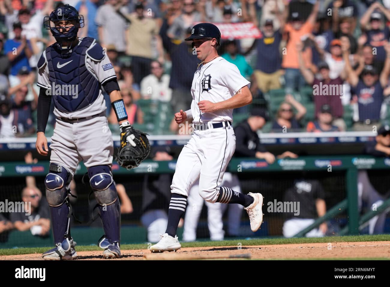 Detroit Tigers Kerry Carpenter scores the game winning run during the 10th inning of a baseball game against the New York Yankees, Thursday, Aug