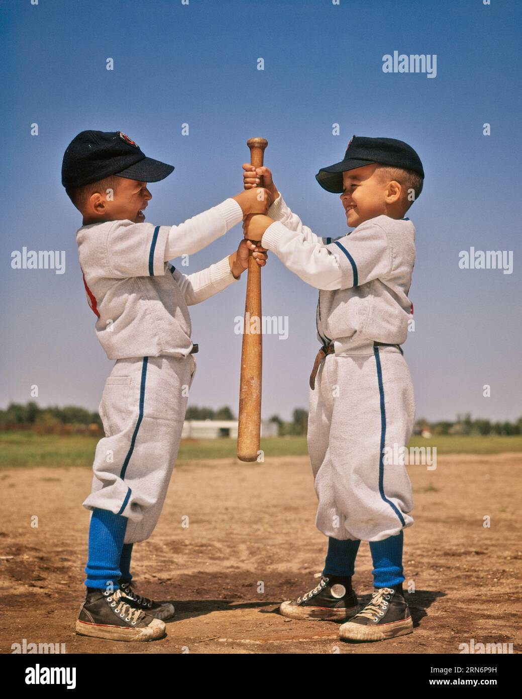 Boys with ball 1960s hi-res stock photography and images - Alamy