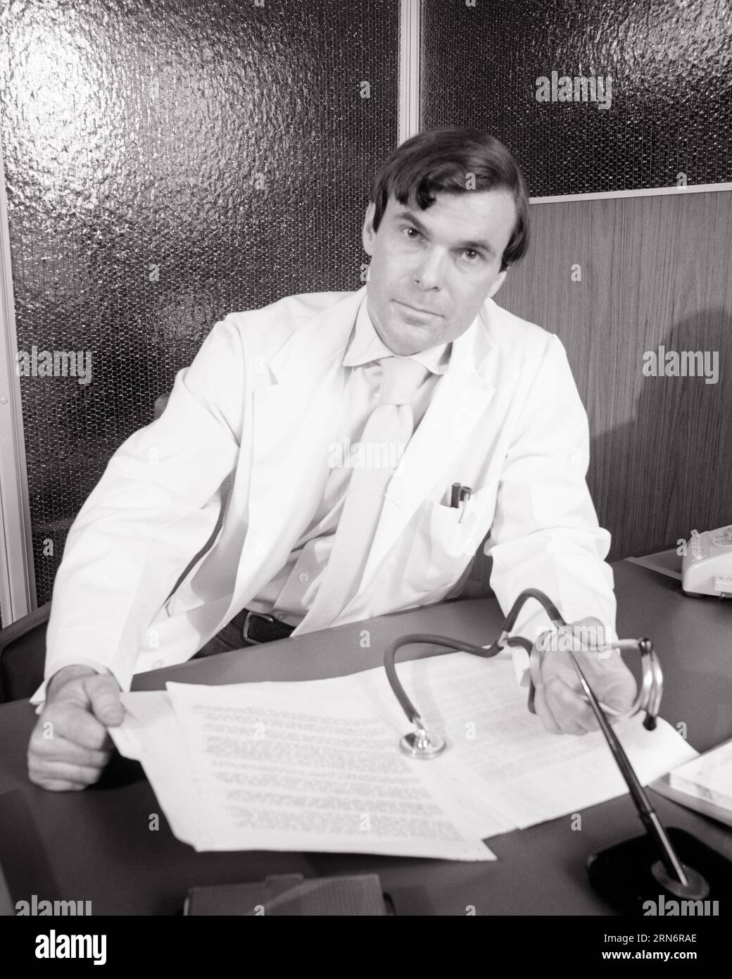 Worried doctor patient 1970s hires stock photography and images Alamy