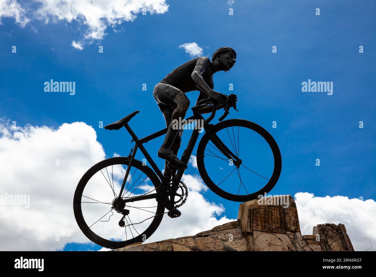 COMBITA, COLOMBIA - AUGUST 2023. Life-size monument in honor of the famous cyclist Nairo Quintana in the main square of the Municipality of Combita Stock Photo