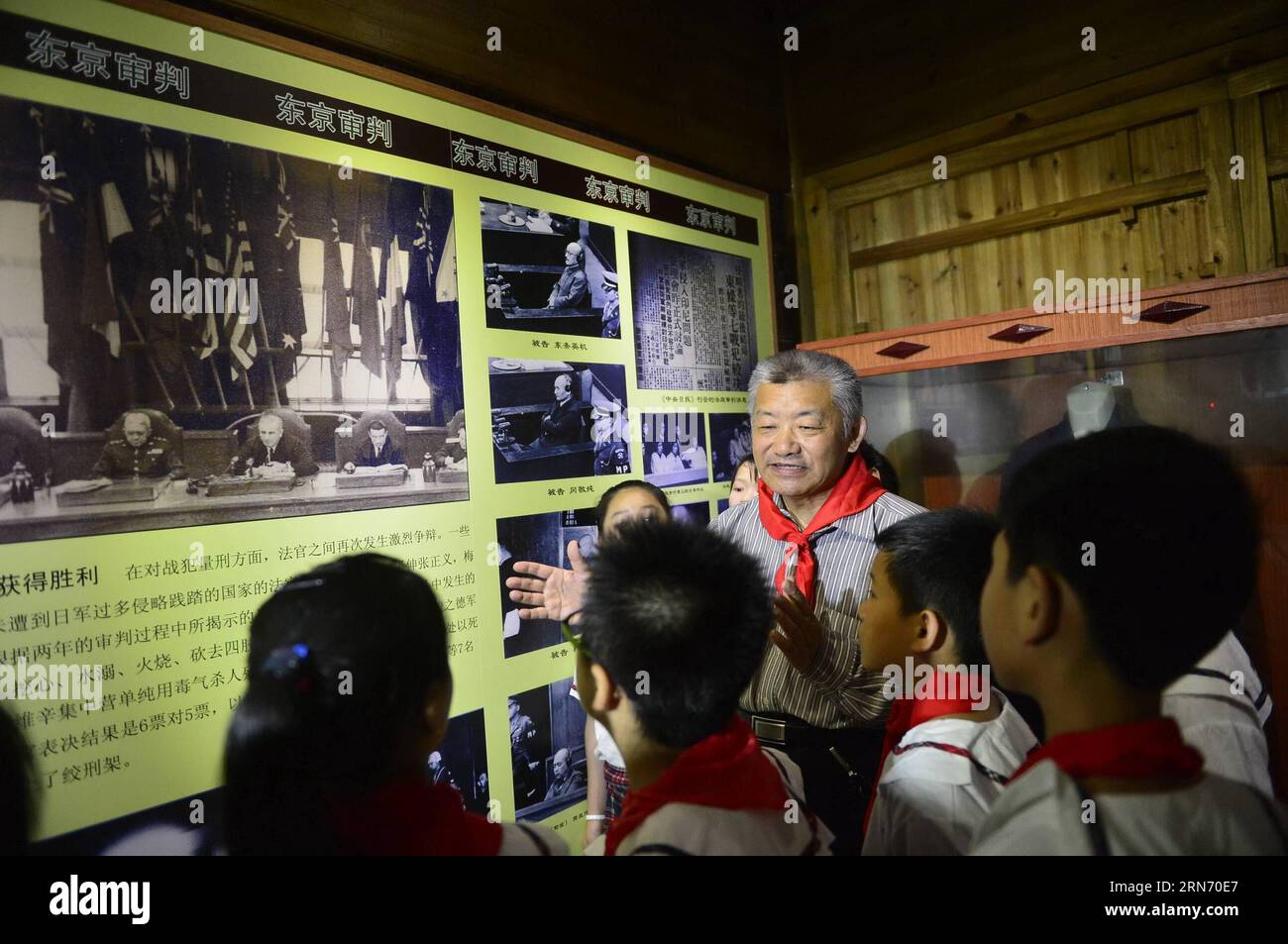 (150812) -- NANCHANG, Aug. 12, 2015 -- Mei Xiao ao, son of Mei Ru ao, the Chinese judge at the International Military Tribunal for the Far East, presents the history about Tokyo trials to students at his father s former residence during an activity marking the 70th anniversary of victory in the Chinese People s War of Resistance Against Japanese Aggression in Qingyunpu District of Nanchang, east China s Jiangxi Province, Aug. 12, 2015. ) (xcf) CHINA-JIANGXI-NANCHANG-COMMEMORATION-ACTIVITY (CN) ZhouxMi PUBLICATIONxNOTxINxCHN   150812 Nanchang Aug 12 2015 Mei Xiao Ao Sun of Mei RU Ao The Chinese Stock Photo